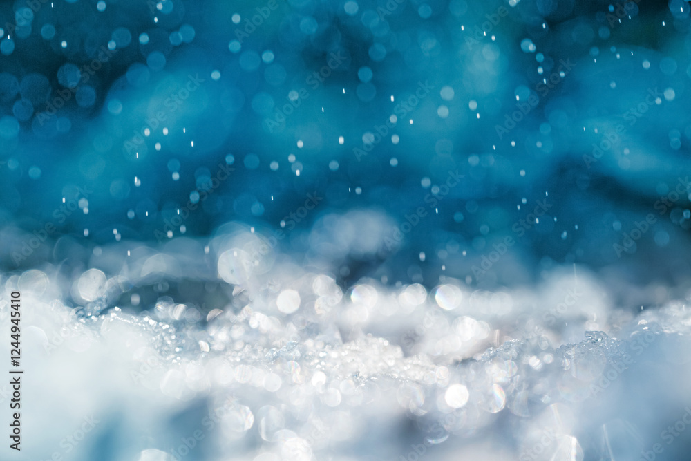 Winter background, banner with selective focus. Close-up view of melted snow during the snowfall