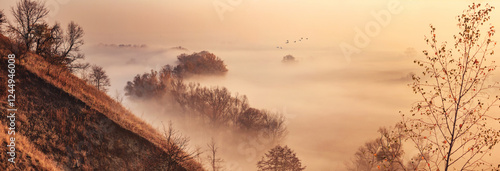 Obraz na płótnie Autumn landscape, background - the morning fog over the river valley, horizontal panorama, banner w salonie