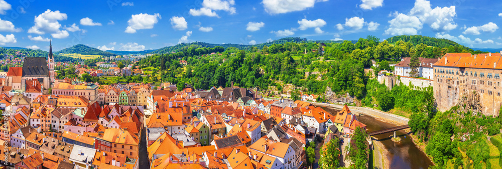 Summer cityscape, panorama, banner - top view of the Old Town of Cesky Krumlov and the Vltava river, Czech Republic