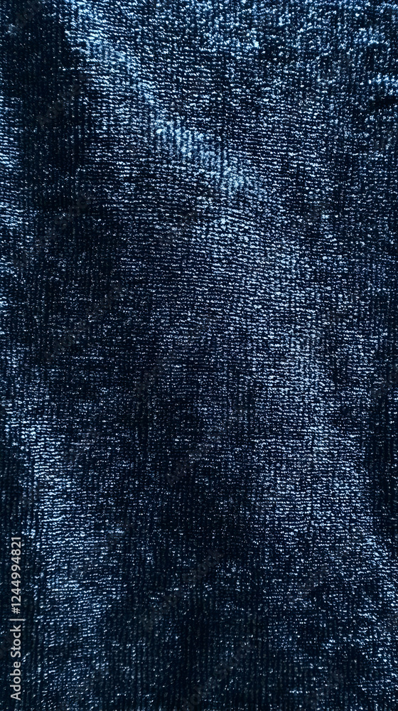 Naklejka premium Close-up of Blue Textured Fabric Shows Intricate Weaving Pattern, Creating a Visually Appealing Design.