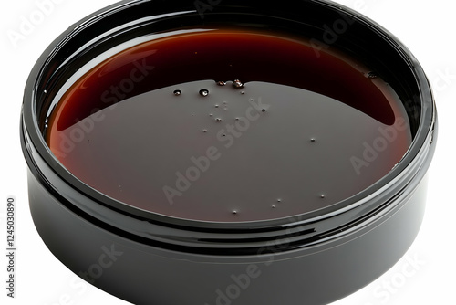 Dark Brown Liquid Substance...