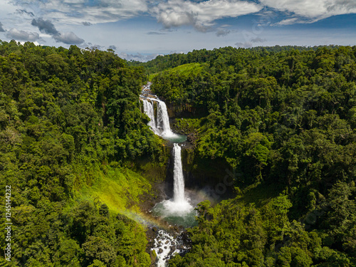 Limunsudan Falls the two-tiered water cascade in mountain. Mindanao, Philippines.