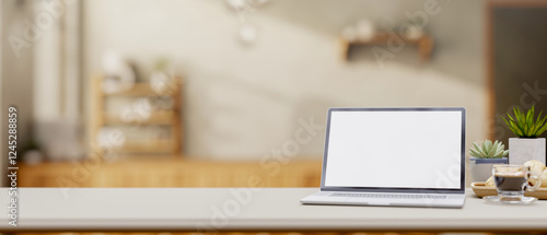 Wallpaper Mural A close-up of a laptop and decorative items on a desk in a minimalist coffee shop. Torontodigital.ca