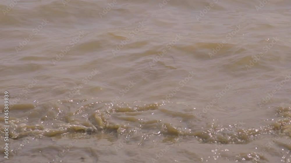 4k aerial video of rising tide splashing on shore at peaceful coastal location 4k aerial video of rising tide splashing on shore at peaceful coastal location