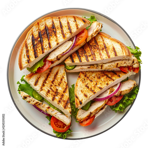 Grilled chicken sandwiches with lettuce, tomato, and avocado slices on a ceramic plate, top view.