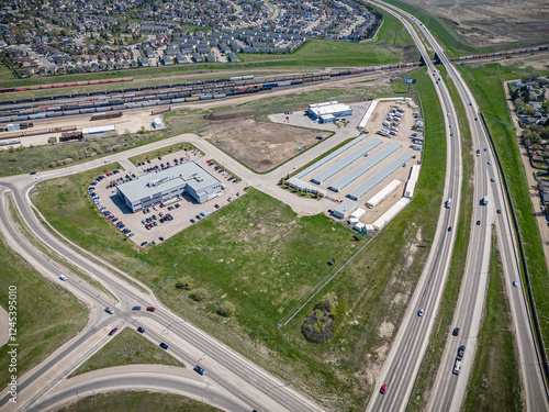 Busy highway with a large building in the middle