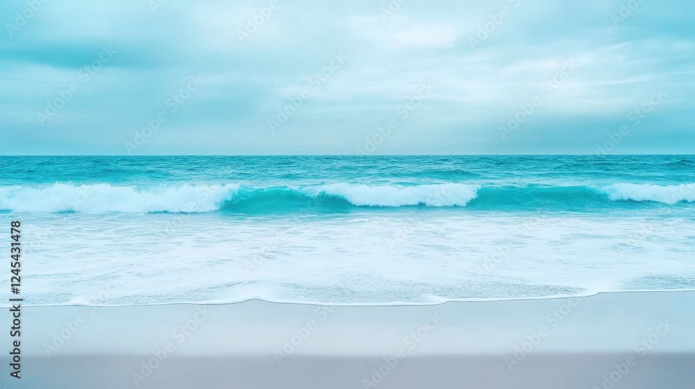 Serene Coastal Scene: Turquoise waves gently caress a pristine beach under a soft, blue-grey sky, creating a calming and tranquil atmosphere. Serene Coastal Scene: Turquoise waves gently caress a pristine beach under a soft, blue-grey sky, creating a calming and tranquil atmosphere.