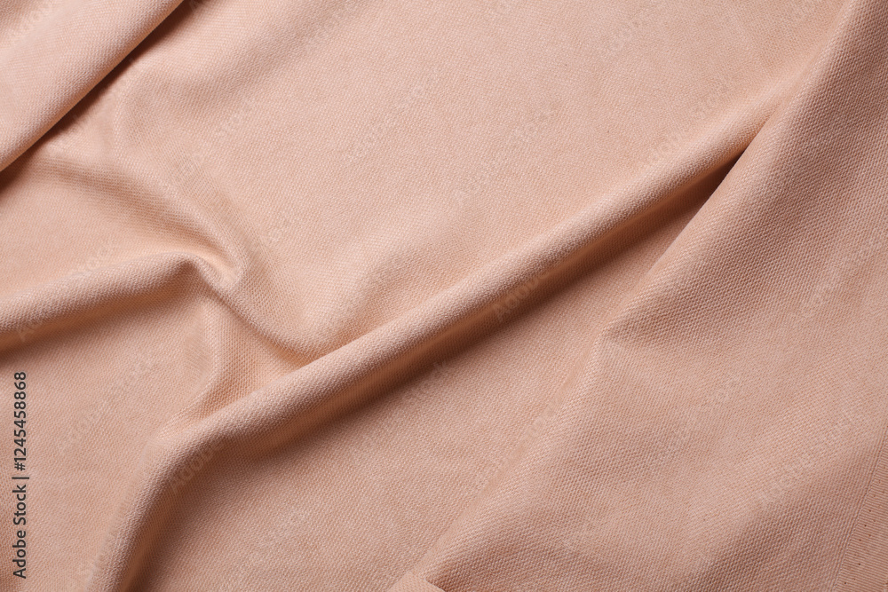Fototapeta premium Beige microvelour texture. Fabric wavy background