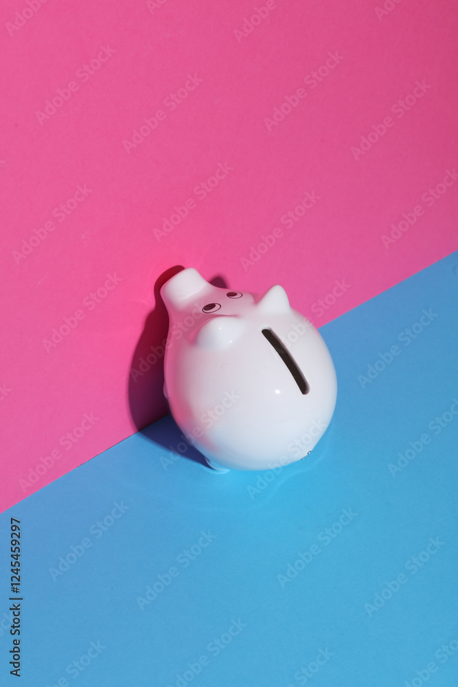 Piggy bank on blue pink background. Creative layout Piggy bank on blue pink background. Creative layout