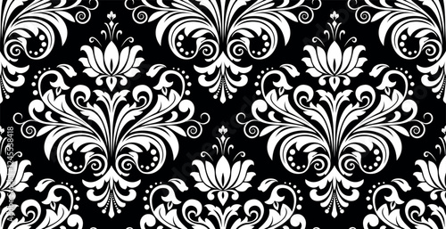 Wallpaper in the style of Baroque. White and black floral ornament. Seamless vector background. Graphic pattern for fabric, wallpaper, packaging. Ornate Damask flower illustration.
