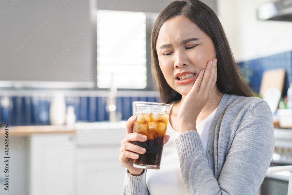 Health care asian young woman touching mouth, expression, girl suffering from toothache, decay or sensitivity cavity molar tooth or inflammation drink cold, sparkling water. Sensitive teeth people. Health care asian young woman touching mouth, expression, girl suffering from toothache, decay or sensitivity cavity molar tooth or inflammation drink cold, sparkling water. Sensitive teeth people.