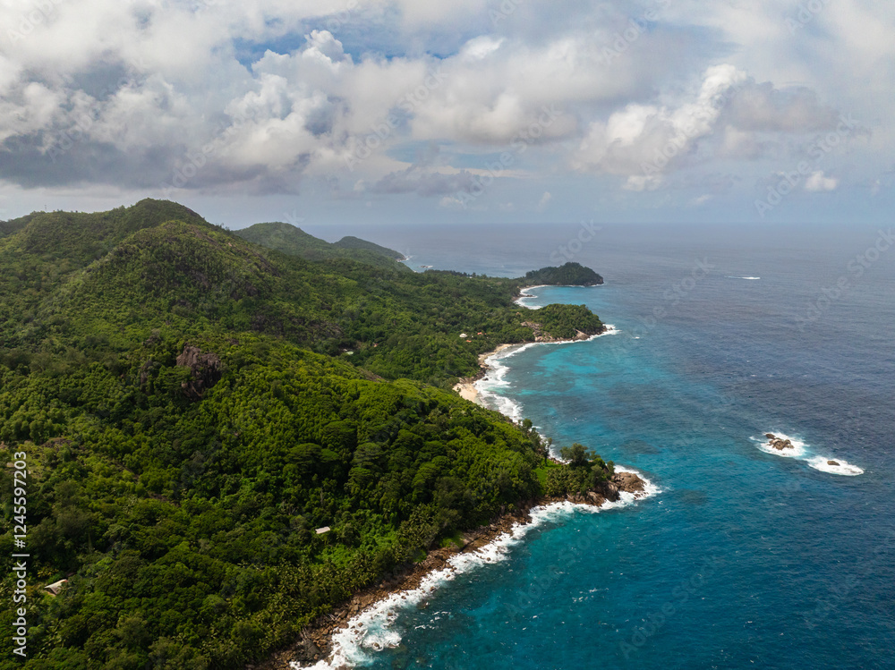 Aerial view of Mahe island with jungle and blue ocean. Seychelles. Aerial view of Mahe island with jungle and blue ocean. Seychelles.