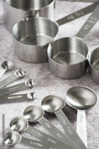 measuring spoons and cups displayed photo