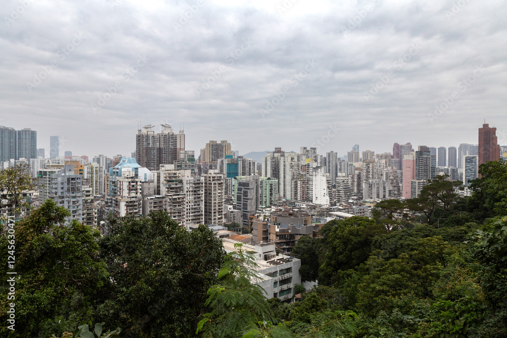 Macau's cityscape viewed from a viewpoint during cloudy day Macau's cityscape viewed from a viewpoint during cloudy day