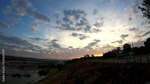 Wallpaper Mural Timelapse of fast-moving clouds at the Mekong River on January 9, 2025 Torontodigital.ca
