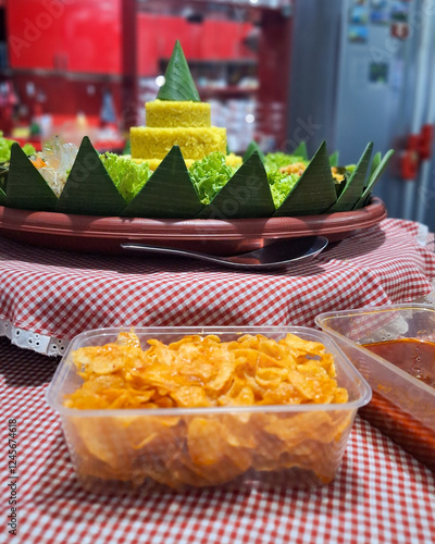 Mustofa or kering kentang or chili fried potato in a plastic box