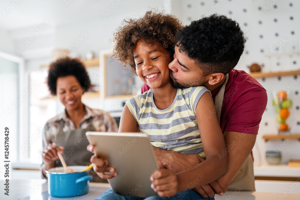 Happy african american preeteen girl using digital tablet for education, fun at home. Family concept Happy african american preeteen girl using digital tablet for education, fun at home. Family concept