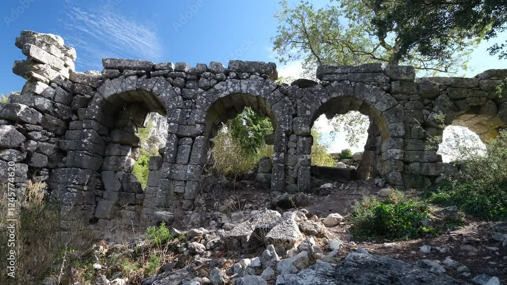 The ruins of the ancient city of Termessos. One of Turkey's most iconic archaeological sites. The gateway to the Temple of Artemis. Antalya province, Turkey country The ruins of the ancient city of Termessos. One of Turkey's most iconic archaeological sites. The gateway to the Temple of Artemis. Antalya province, Turkey country