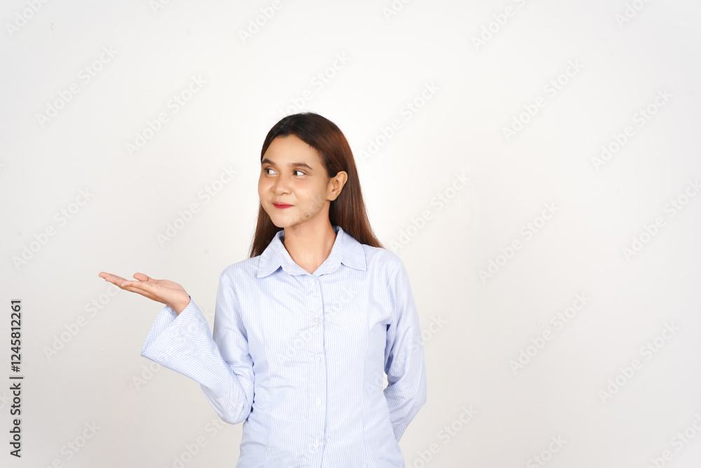 Showing and Presenting Product at Open Palm Of Beautiful Asian Woman Isolated On White Background Showing and Presenting Product at Open Palm Of Beautiful Asian Woman Isolated On White Background