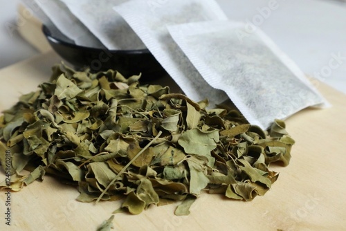 Fresh Moringa tea isolated on white background. Healthy lifestyle concept tropical herb Moringa ( Teh Daun Kelor )