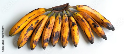Bunch of ripe yellow bananas on a clean white background showcasing their natural texture and vibrant color.