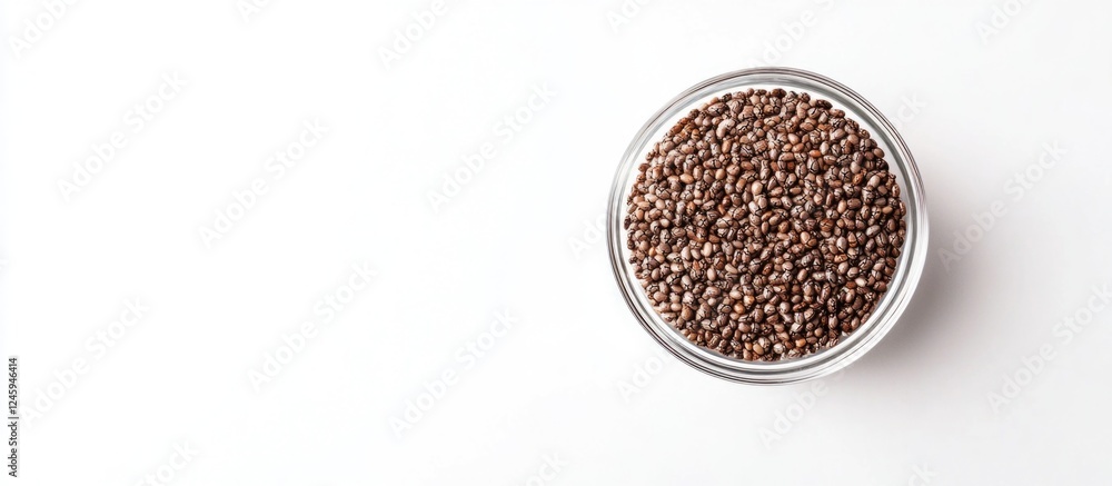 Chia seeds in a glass bowl on white background showcasing superfood benefits for nutrition and weight loss supplementation. Chia seeds in a glass bowl on white background showcasing superfood benefits for nutrition and weight loss supplementation.