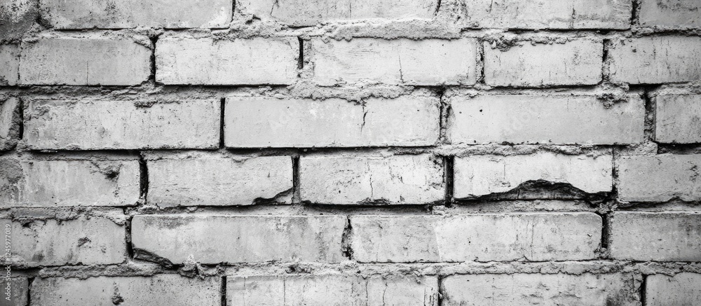 Textured Closeup of Horizontal Grey Brick Wall Background for Architecture and Design Projects Textured Closeup of Horizontal Grey Brick Wall Background for Architecture and Design Projects