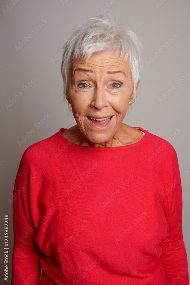 surprised senior woman looking dumbfounded and slightly confused but happy surprised senior woman looking dumbfounded and slightly confused but happy