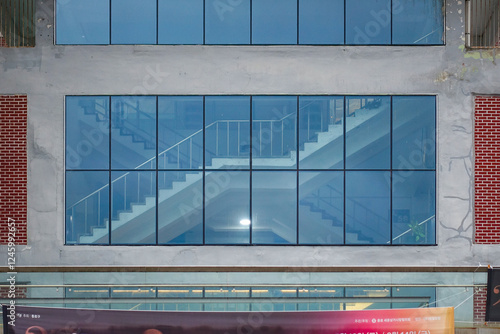 A collection of various exterior windows on buildings, showcasing diverse architectural styles and materials.