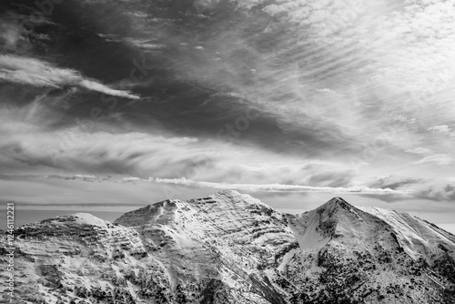 Black and white winter view of Mount Grem and Cima Foppazzi, Orobic Alps, Val Brembana, Bergamo, Lombardia, Italy. photo