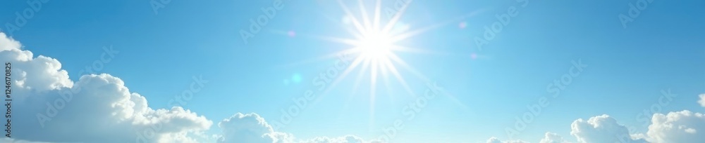 The sun shines through the wispy clouds in the clear blue sky, shining, light The sun shines through the wispy clouds in the clear blue sky, shining, light