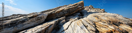 Panoramic View of a Rocky Mountain Peak with Person