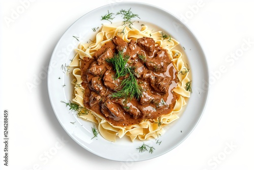 Delicious beef stroganoff with egg noodles and fresh dill on a white plate elegant food photography