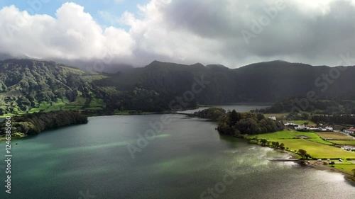 Sete Cidades, São Miguel, Azores, Volcanic Caldera. A depression formed after a volcanic eruption, now filled with two lakes – one blue (Lagoa Azul) and the other green (Lagoa Verde). King's Bridge (P