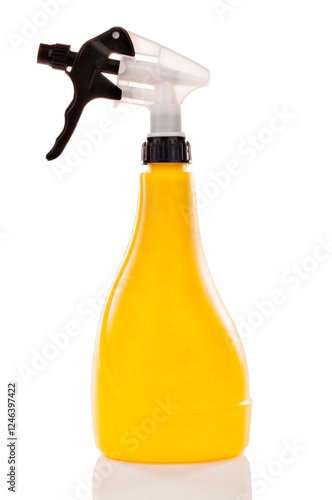 Yellow sprayer on a white background close-up.Isolated.