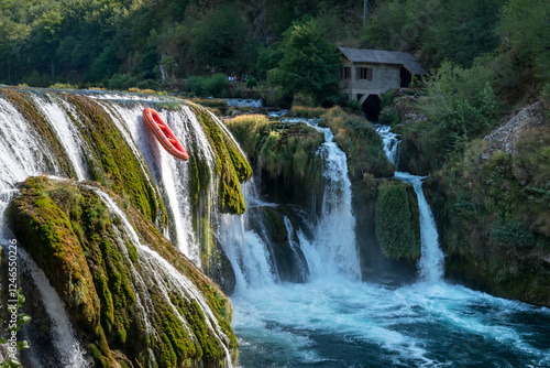 Rafting on the Una River, Waterfall in Strbacki buk on summer day, Una river. Bosnia and Herzegovina.