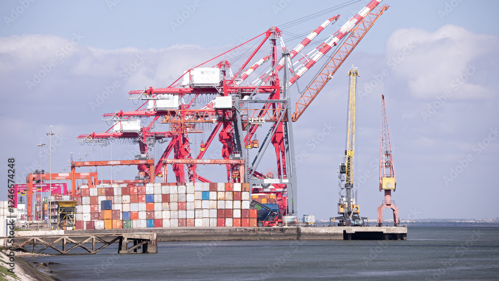 Container terminal timelapse and gantry cranes used for loading cargo on the large container ships in the port of Lisbon. Portugal. Container terminal timelapse and gantry cranes used for loading cargo on the large container ships in the port of Lisbon. Portugal.