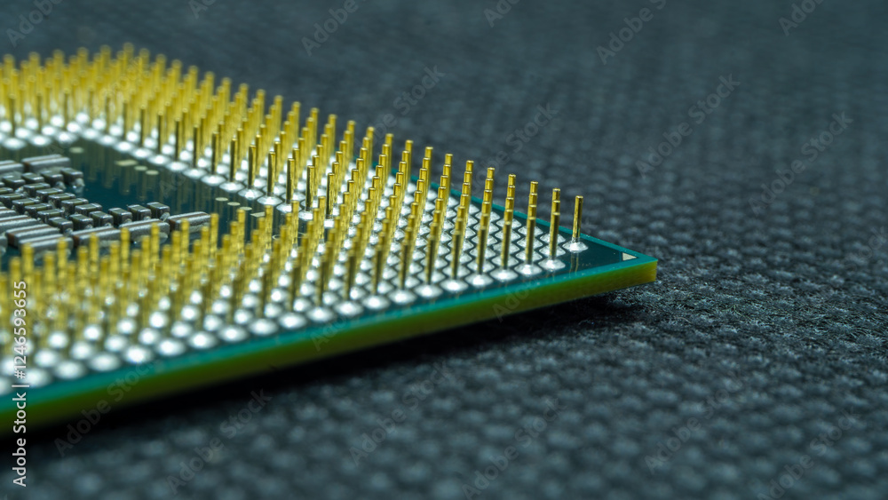 Close-Up View of a Computer Processor Unit on a Dark Textured Surface Close-Up View of a Computer Processor Unit on a Dark Textured Surface