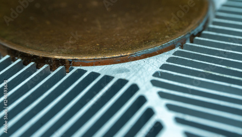 Close-Up of Metal and Copper Elements in Modern Technology Assembly photo