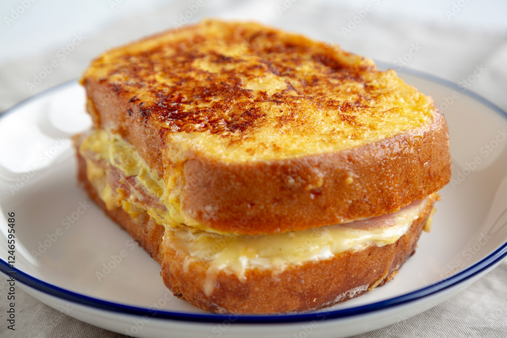 Homemade French Monte Cristo Sandwich, low angle view. Close-up. Homemade French Monte Cristo Sandwich, low angle view. Close-up.
