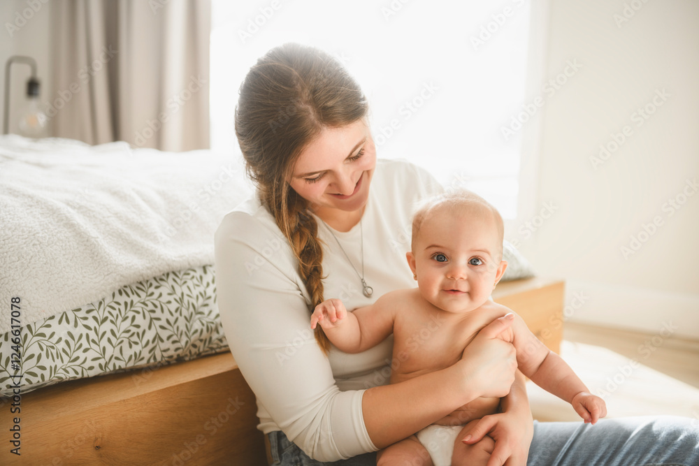portrait of happy young mother and infant girl on bedroom portrait of happy young mother and infant girl on bedroom