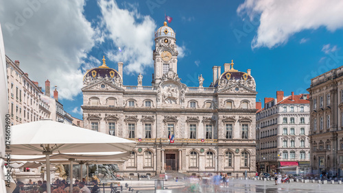 Hyperlapse of Hotel de Ville de Lyon, the historic city hall of Lyon, France. People stroll near the fountain on the square timelapse.