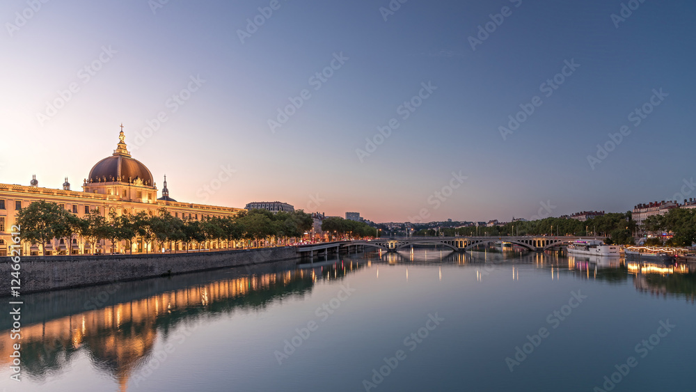 Fototapeta premium The Grand Hotel-Dieu Day to night transition timelapse hyperlapse in Lyon, France.