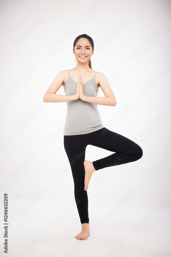 Asian girl practice yoga on white background Asian girl practice yoga on white background