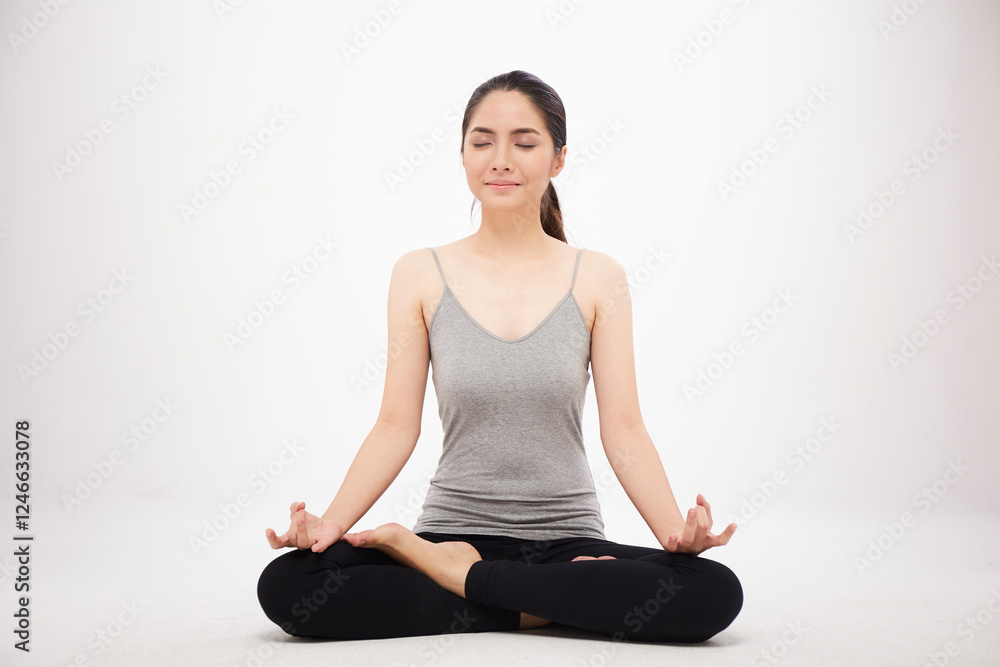 Asian girl practice yoga on white background Asian girl practice yoga on white background