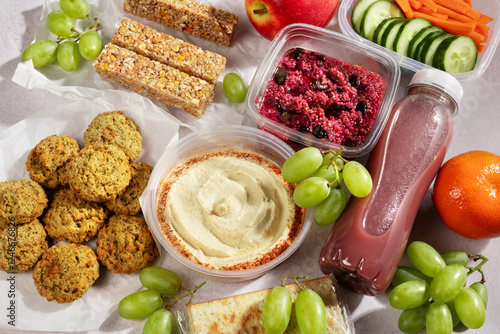 Ready prepared animal protein free quinoa salad, snack, smoothie. Quick food for lunch break, ready vegan meal overhead photo