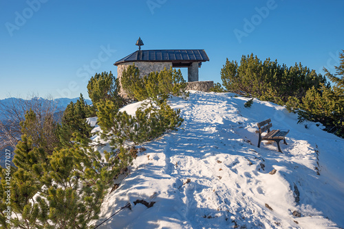 small chapel at Fahrenbergkopf mountain, winter landscape upper bavaria photo