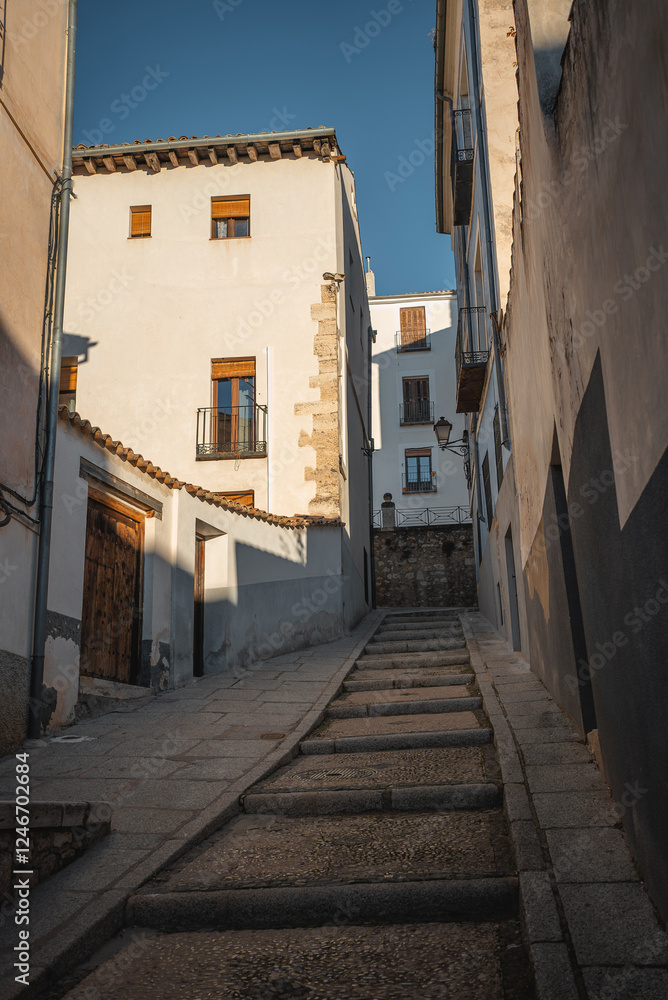 Fototapeta premium ancient stairs with pavement of old cozy European town, Cuenca, Spain