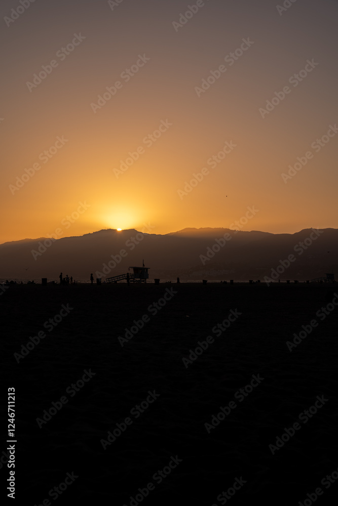 beautiful sunset on the beach of Santa Monica with the mountains beautiful sunset on the beach of Santa Monica with the mountains