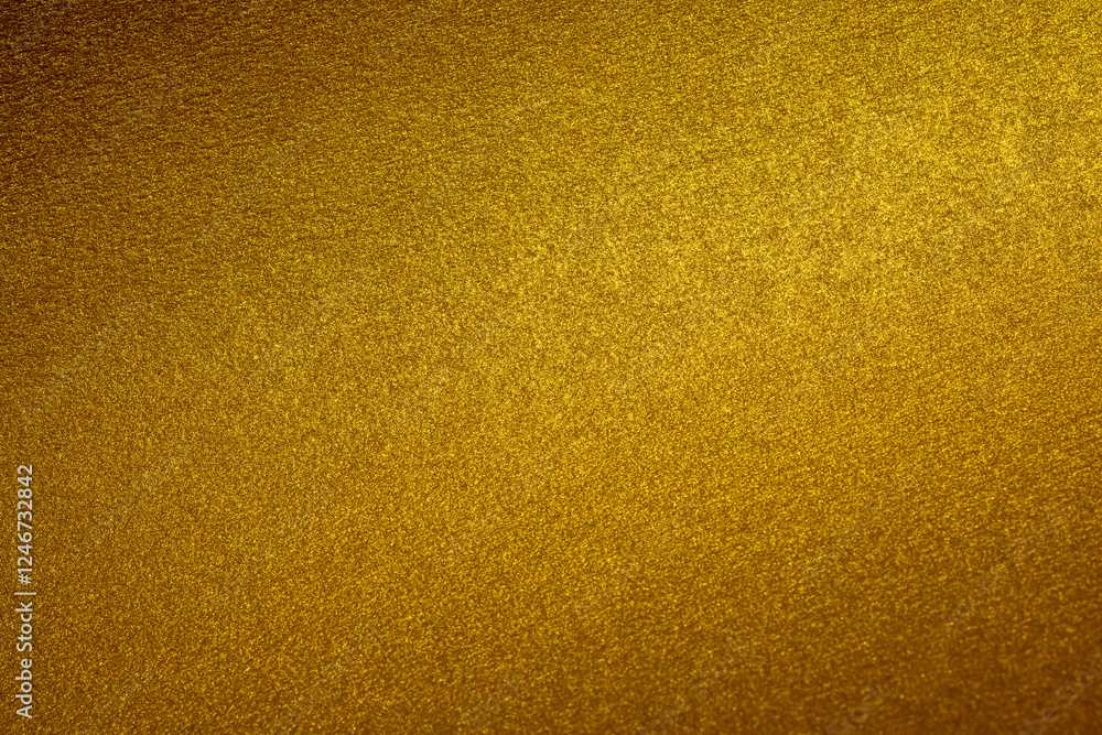 Shimmering golden texture is creating an elegant and luxurious background with selective focus. Shimmering golden texture is creating an elegant and luxurious background with selective focus.